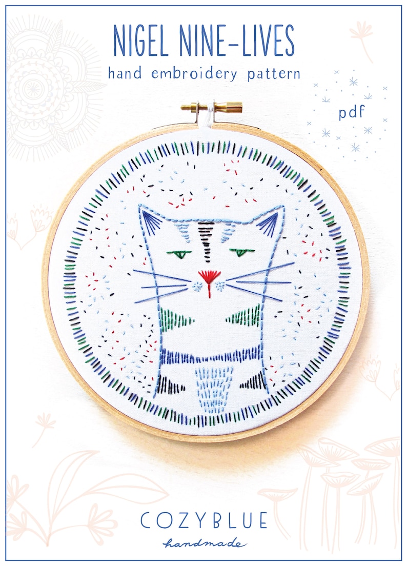 May include: A hand embroidery pattern for a cat named Nigel. The pattern is in a hoop and features a stylized cat with blue, green, and black embroidery on a white background. The pattern is titled "Nigel Nine-Lives" and is available as a PDF download. The text "Cozyblue handmade" is at the bottom of the image.