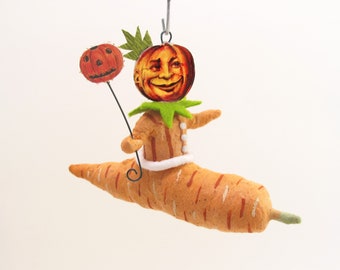 Spun Cotton Vintage Inspired Pumpkin Person In A Carrot Canoe Halloween Ornament