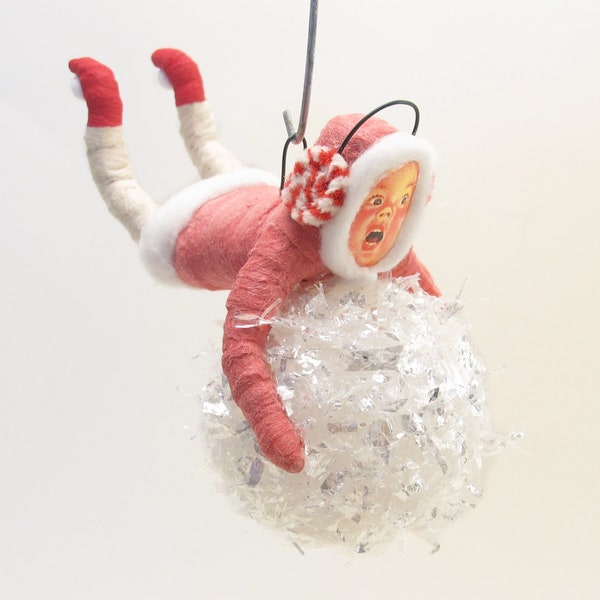 Child Holding On To Giant Snowball For Dear Life - Red - Vintage Inspired Spun Cotton Ornament