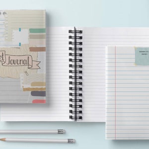 May include: Two spiral bound notebooks, one with a colorful design and the words "Bullet Journal" on the cover, and the other with a plain white cover and lined pages.