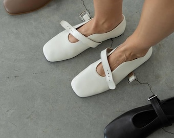 Zapatos Mary Jane de cuero negro: planos con tiras en T para mujer