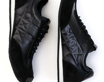 Handcrafted Black Leather Sneakers: Stylish Women's Casual Shoes