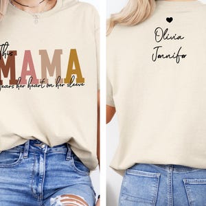 Custom This Mama Wears Her Heart On Her Shirt, Personalized Mom t-shirt With Kids Names, Cute Momma Outfit, Mothers Day Gifts