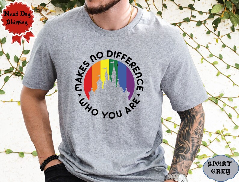 May include: A gray t-shirt with a rainbow-colored circle around a silhouette of a castle. The text "Makes no difference who you are" is written around the circle.