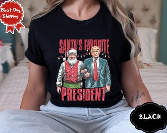 サンタのお気に入りの大統領シャツ、トランプクリスマスTシャツ、サンタトランプシャツ、クリスマス共和党セーター、面白いトランプ2026