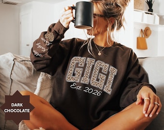 Custom Leopard Gigi Sweatshirt With Kid Name On Sleeve, Personalized Gigi Sweatshirt,Gift For Gigi,Mothers Day Gift,Gigi Est Year Sweatshirt