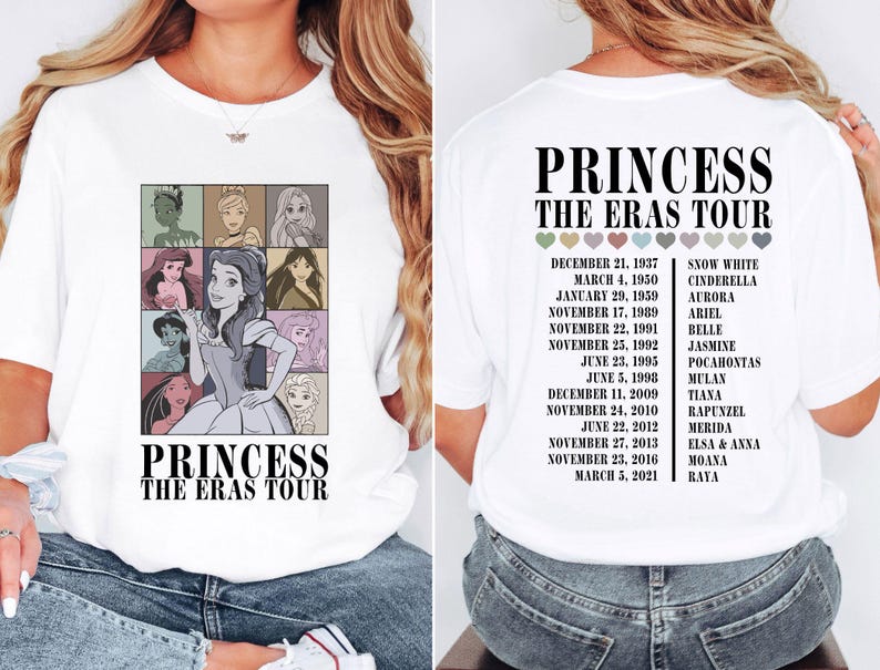 May include: White t-shirt with a graphic of Disney princesses and the text "Princess The Eras Tour". The graphic includes the princesses' names and the dates they were released.