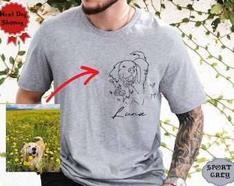 Puede incluir: Una camiseta gris con un dibujo de línea negra de un perro con el nombre "Luna" escrito debajo. El perro está rodeado de flores.