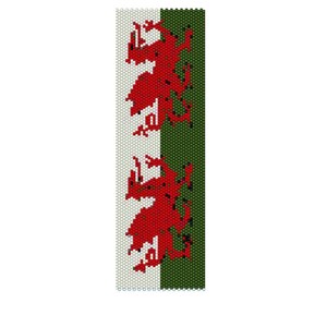 May include: A beaded bracelet with a red dragon design on a white background and a green background.