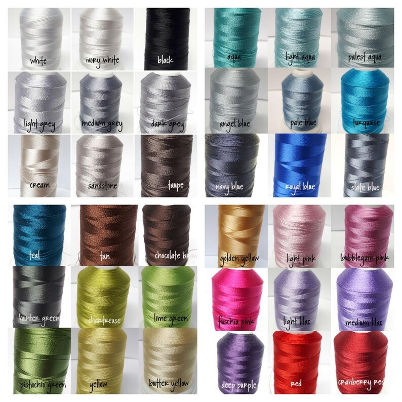 May include: A color chart of 36 spools of embroidery floss, arranged in a grid of six rows and six columns. The spools are labeled with the color names, including white, ivory white, black, aqua, light aqua, palest aqua, light grey, medium grey, dark grey, angel blue, pale blue, turquoise, cream, sandstone, taupe, navy blue, royal blue, slate blue, teal, tan, chocolate brown, golden yellow, light pink, bubblegum pink, hunter green, chartreuse, lime green, fuchsia pink, light lilac, medium lilac, pistachio green, yellow, butter yellow, deep purple, red, and cranberry red.