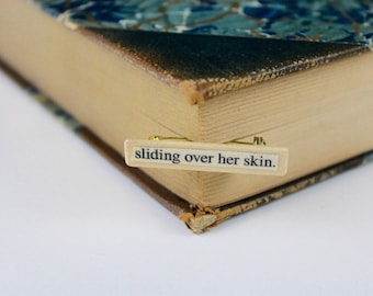 sliding over her skin - Naughty Bits pin - made from recycled trashy romance novel