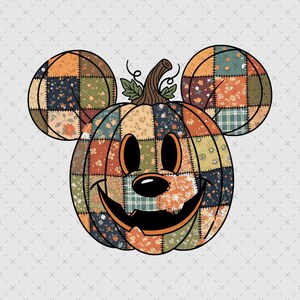 Puede incluir: Un gráfico con forma de calabaza y dos orejas circulares, con un diseño de patchwork de varios patrones florales y de cuadros en tonos naranja, verde, azul y marrón. La calabaza tiene una cara tallada con ojos, nariz y una amplia sonrisa.