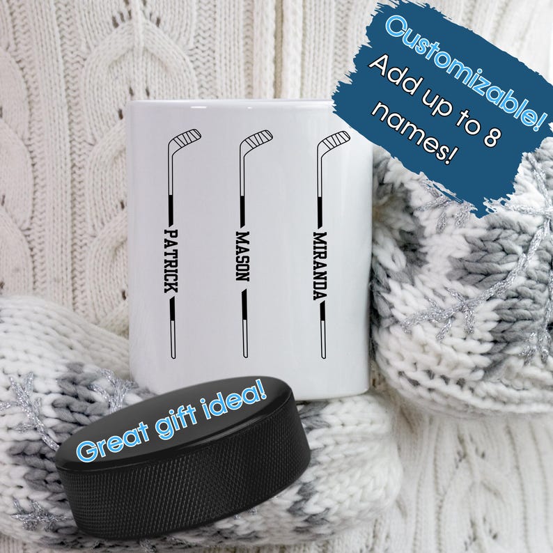 May include: White ceramic mug with black hockey stick graphics and names: Patrick, Mason, and Miranda. A black hockey puck with the text "Great gift idea!" is in front of the mug. The mug is customizable, with space for up to 8 names.