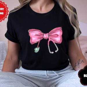 Coquette Nurse Stethoscope Bow shirt, Gift for Nurse, Bow Oversized Shirt, Nurse Appreciation, Christmas Gift for Nurse, Pink Bow