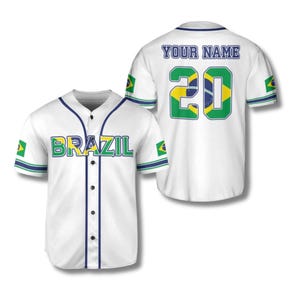 May include: White baseball jersey with the word "BRAZIL" across the chest in green and yellow. The number "20" is on the back, with the text "YOUR NAME" above it. The jersey has blue and green accents and Brazilian flag details.