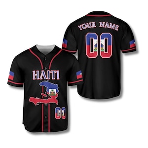May include: Black baseball jersey with red trim, featuring "HAITI" in white lettering and a map of Haiti with the Haitian flag. The jersey also displays the number "00" and the text "YOUR NAME" on the back.