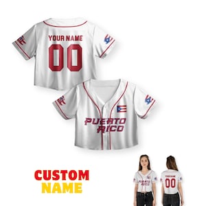 May include: White baseball jersey with red trim and the text "YOUR NAME" and the number "00" on the back. The front of the jersey has the text "PUERTO RICO" and a flag graphic. The words "CUSTOM NAME" are in the bottom left.