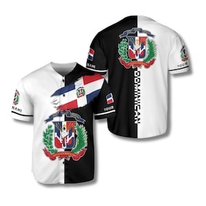 May include: A baseball jersey with a split design, half white and half black. The white side features the Dominican Republic flag and coat of arms. The black side has the word "DOMINICAN" vertically. The sleeves have the text "NAME" and "YOUR".