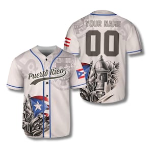 May include: White baseball jersey with blue trim and buttons. The front features the text "Puerto Rico" and a flag graphic. The back has the number "00" and space for a name. The jersey has a baseball theme.
