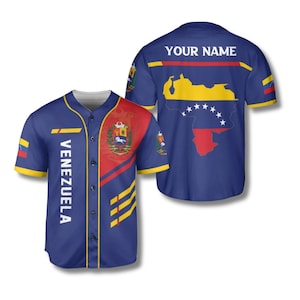 May include: A blue baseball jersey with yellow and red accents. The front of the jersey has the word "VENEZUELA" in white, and the back has a map of Venezuela and the text "YOUR NAME". The jersey features the Venezuelan flag colors.