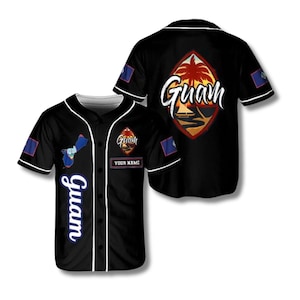 May include: Black baseball jersey with white trim, featuring the word "Guam" in white script on the front and back. The front has a Guam map graphic and a "Your Name" patch. The back displays a Guam landscape design with a palm tree.