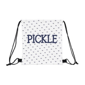 May include: White drawstring bag with a blue and white polka dot pattern and the word "PICKLE" printed in blue.