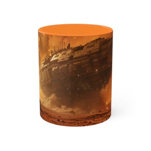 May include: Orange ceramic mug with a spaceship flying over a red planet. The spaceship is brown and has a lot of detail. The planet is red and has a lot of craters.