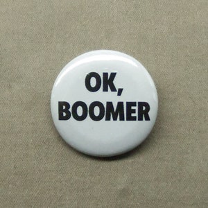 May include: White button with black text that reads "Ok, Boomer".