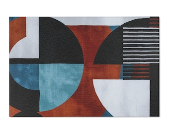 May include: Abstract geometric rug with a design of overlapping circles in shades of black, white, blue, and orange.