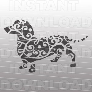 May include: Black and white silhouette of a dachshund dog with a decorative floral pattern. The dog is standing on all four legs with its tail curled up.