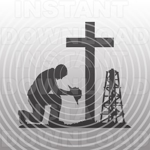 May include: A silhouette of a person kneeling in prayer in front of a cross and an oil derrick. The person is wearing a hat and is looking down. The cross is tall and has a wide base. The oil derrick is made of metal and has a ladder on the side.