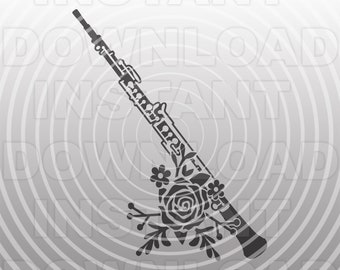 Puede incluir: Una silueta en blanco y negro de un oboe con un diseño floral. El oboe está decorado con una rosa y hojas.