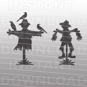 May include: Two black silhouette cutouts of scarecrows with crows perched on their hats. The scarecrows are standing on a pole with a simple design.