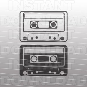 May include: Two black and white cassette tapes with a rectangular shape. The tapes have a rectangular window in the center with two round holes on either side. The tapes have a series of small round holes on the bottom.