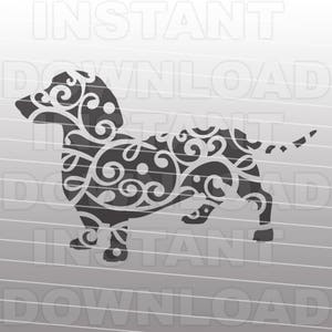 May include: Black and white silhouette of a dachshund dog with a decorative floral pattern. The dog is standing on all four legs with its tail curled up.