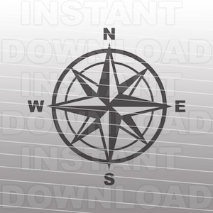 May include: A black and white compass with the letters N, S, E, and W. The compass is in the shape of a star with eight points.
