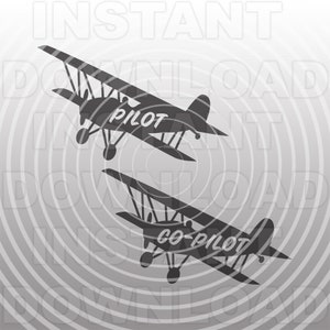 May include: Two black and white silhouette airplanes flying in a circular pattern. The top plane has the word "PILOT" written on it. The bottom plane has the words "CO-PILOT" written on it.