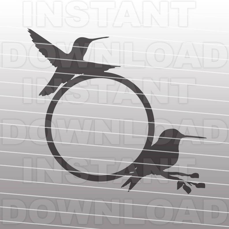 May include: A black silhouette of two hummingbirds with a circular frame. The hummingbirds are facing opposite directions. The hummingbird on the left is perched on the top of the frame. The hummingbird on the right is perched on the bottom of the frame.