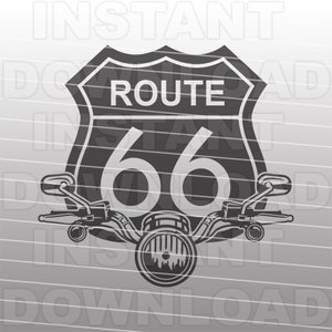 May include: A black and white graphic design of a motorcycle with a Route 66 sign. The sign is a classic shield shape with the number 66 in white and the words "Route" in white.