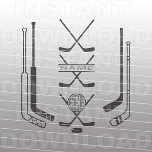 May include: A black and white design featuring hockey sticks and a puck. The design includes the text "NAME" and a circle with the letters "EEE" inside.