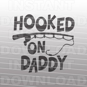 May include: Black and white graphic design with the text "Hooked on Daddy" and a fishing rod and hook.