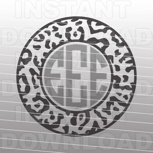 May include: A black and white leopard print circle with a monogram in the center. The monogram is in a gray font and the letters are "EEF".