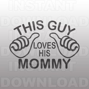 May include: Black and white graphic design with two thumbs up forming a heart shape. The text reads "This Guy Loves His Mommy".