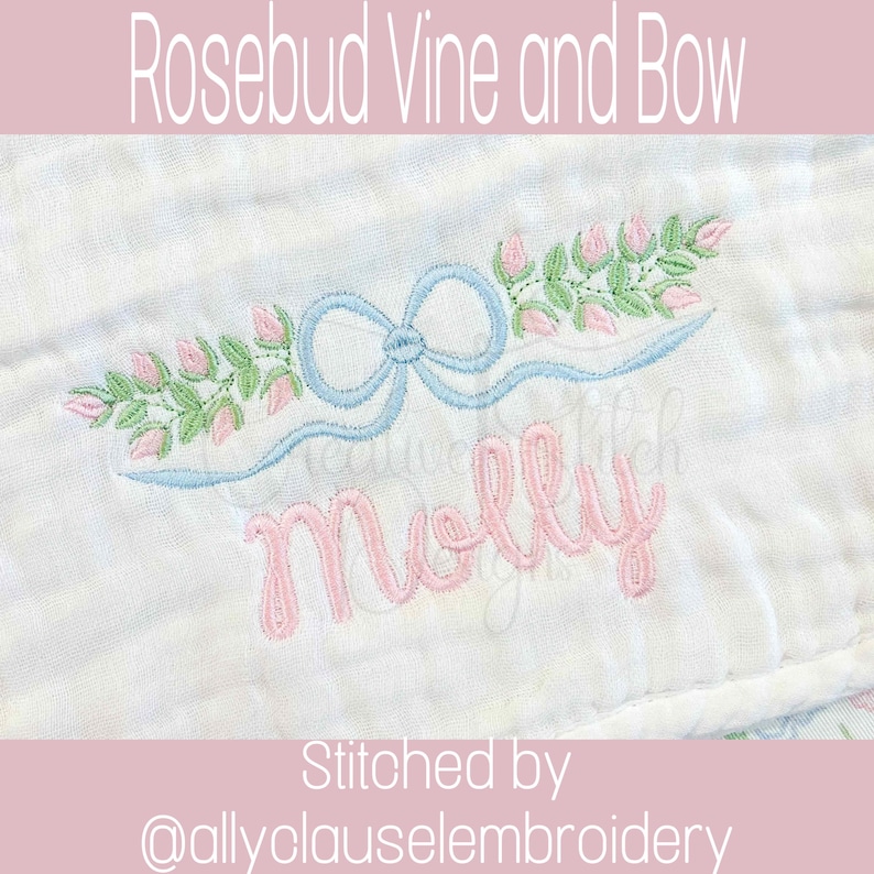 May include: Embroidered design featuring a light blue bow and a garland of pink rosebuds and green leaves. The name "Molly" is embroidered in pink script below the bow. The text "Rosebud Vine and Bow" is at the top.
