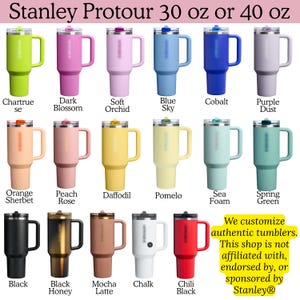a collection of 16 different colored stainless steel tumblers, each with a unique color and design.
