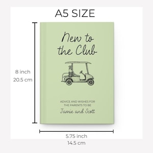 Op de afbeelding: A5-formaat journal met een lichtgroene kaft. De kaft toont de tekst "New to the Club" boven een golfkar-illustratie. Het journal is 20,5 cm hoog en 14,5 cm breed.