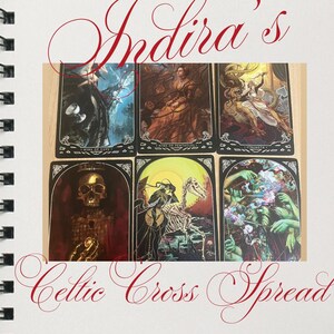 May include: A spread of six tarot cards featuring detailed illustrations with dark, gothic themes. The cards are arranged on a light background, with the words "Indira's Celtic Cross Spread" in red script.