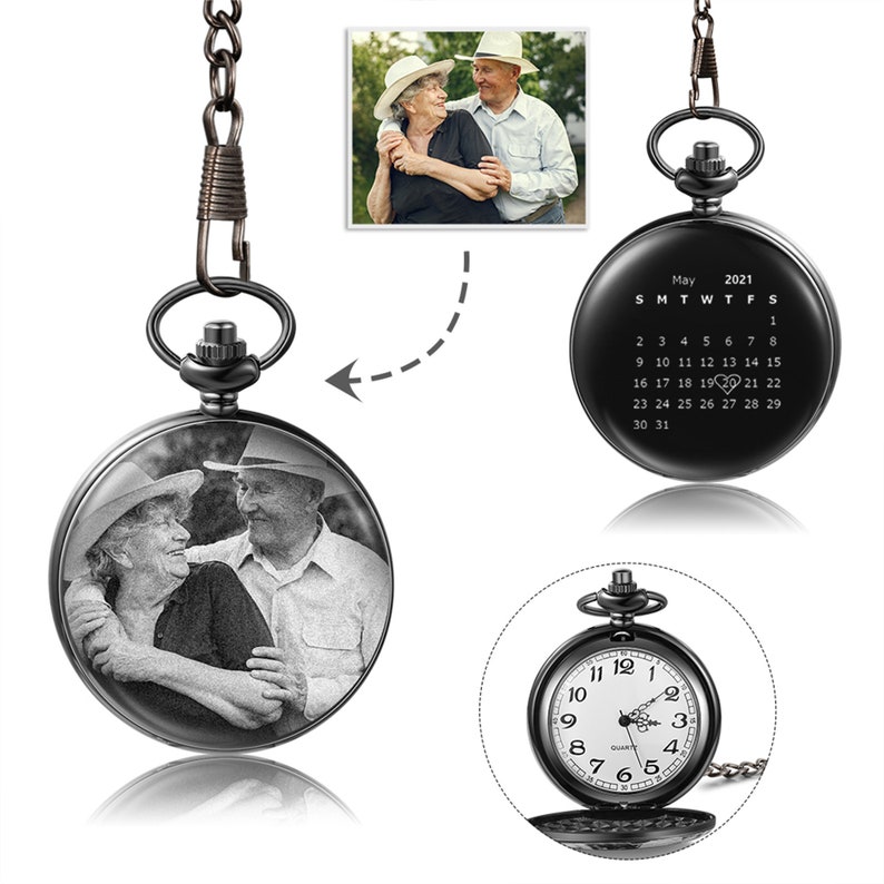May include: Black pocket watch with a photo of an older couple on the front. The back of the watch has a calendar for May 2021 with a heart over the 19th.