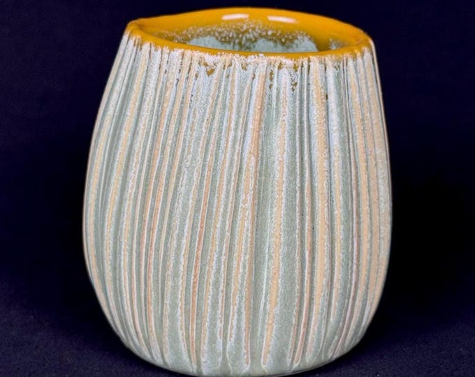 handmade porcelain cup in green and orange