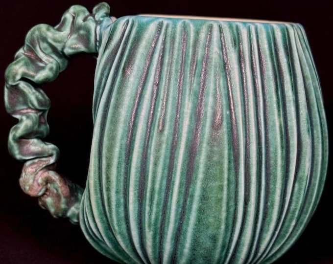 handmade whimsical porcelain mug in turquoise and violet